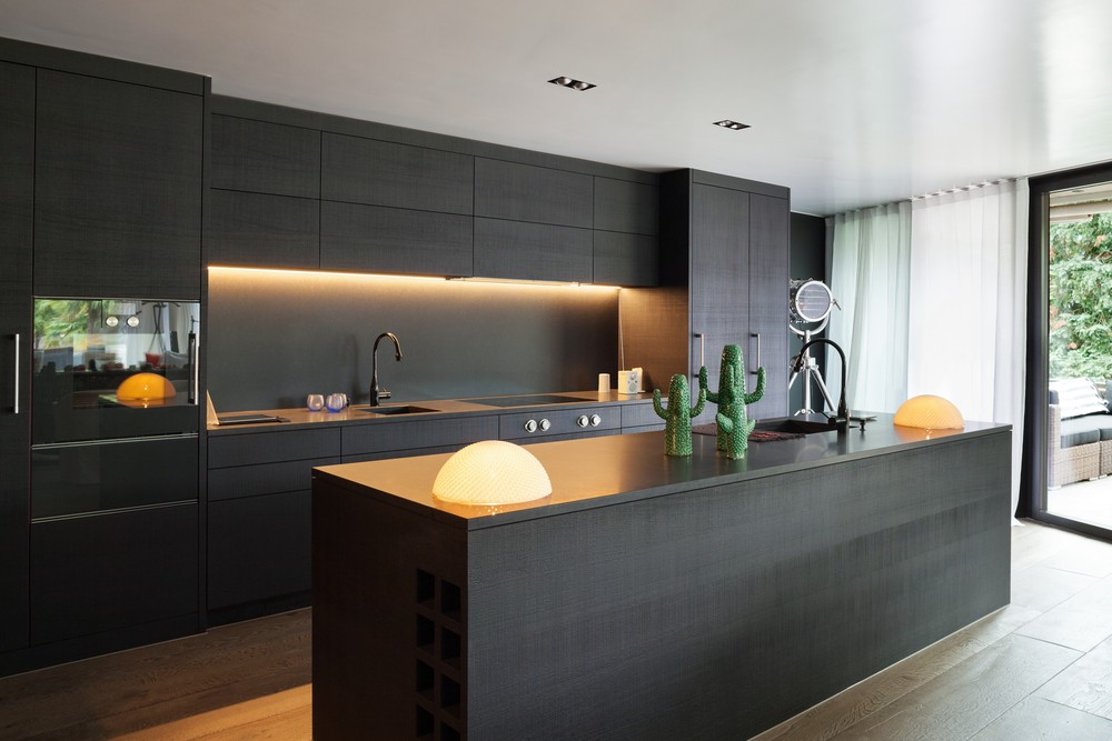 Modern kitchen in Brisbane featuring stylish lighting design that enhances both function and aesthetics