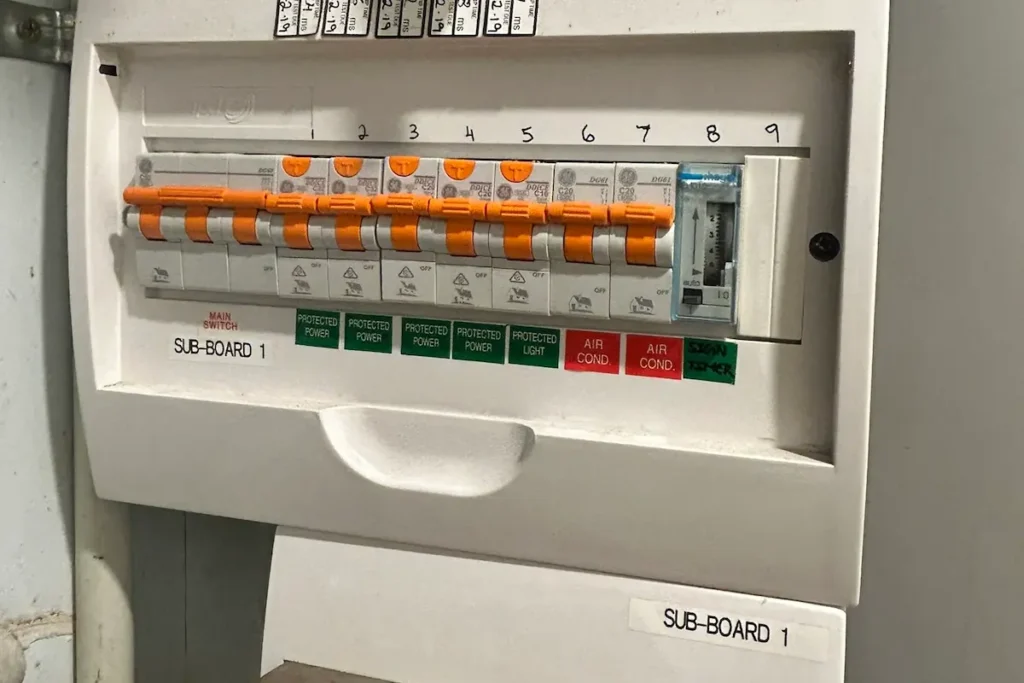 Modern residential sub-board in Brisbane with 9 RCBO circuits including dedicated 32 amp EV ready circuit installed by SEQ Sparky alongside aircon garage power and pool pump
